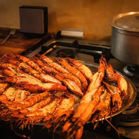 Grilled prawns on a platter, fresh from the kitchen