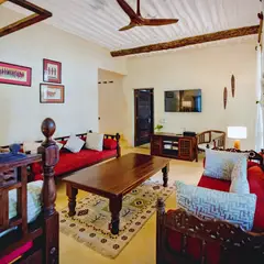The sitting room with Swahili sofas and deep cushions